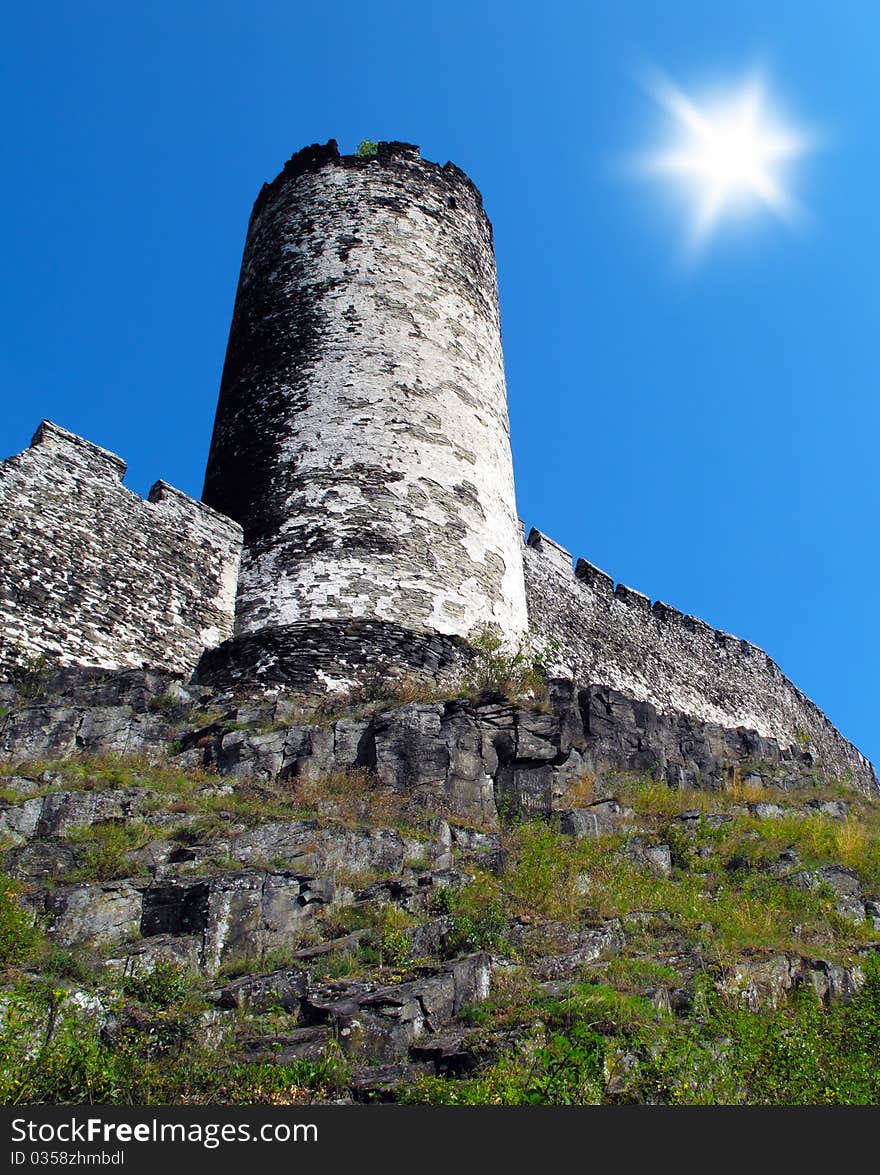 Castle tower with stone wall in sunny weather. Beautiful old castle Bezdez in Czech republic, Europe.