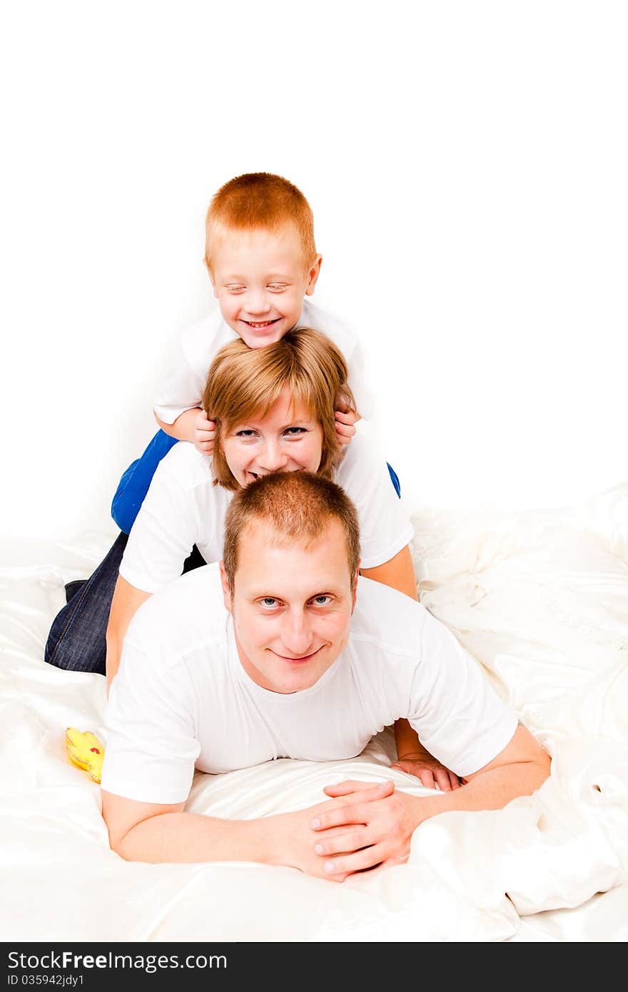 Mother, father and son on a white background. Mother, father and son on a white background