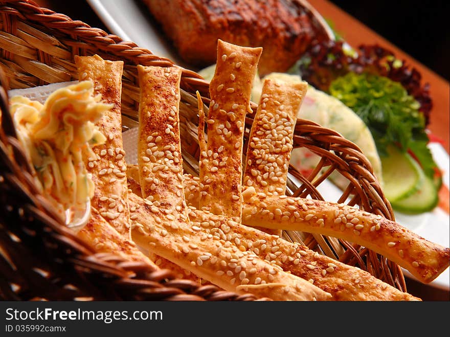 Fresh grain sticks with a sesame, oil in a basket