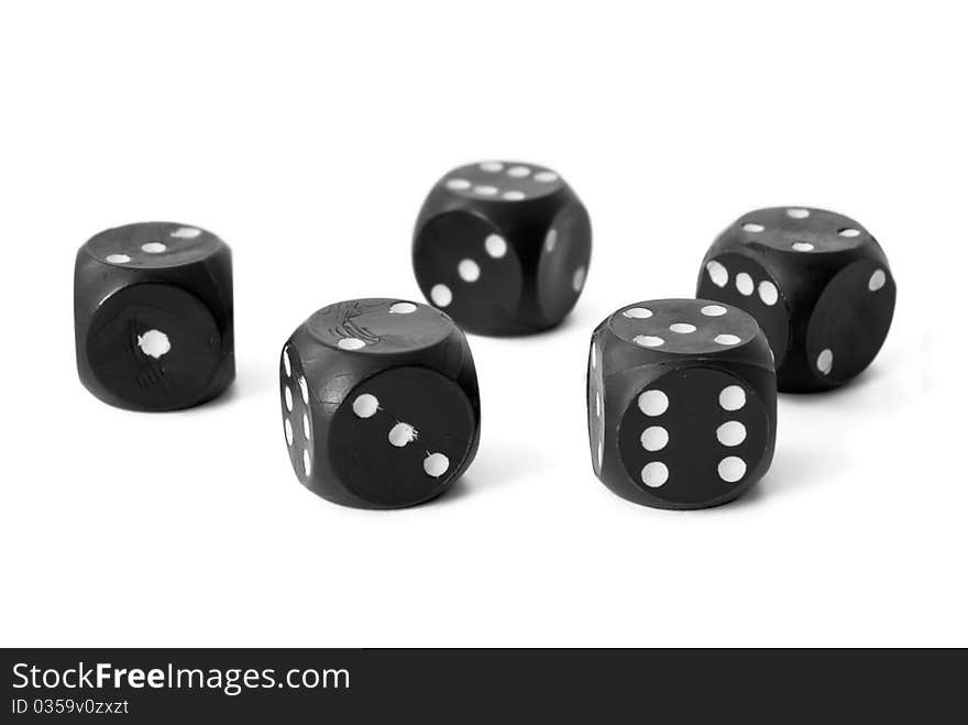 Five black dices isolated on white background