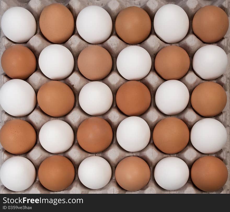 Alernative white and brown eggs than a checkerboard