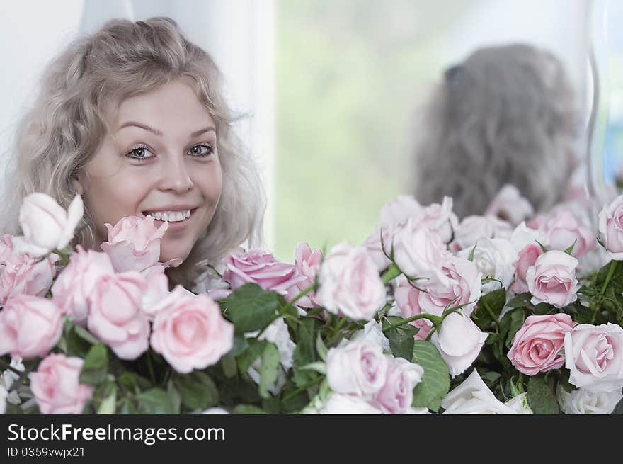 Portrait of young pretty woman with beautiful flowers. Portrait of young pretty woman with beautiful flowers