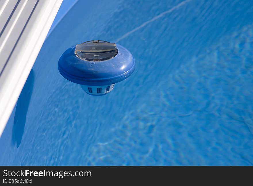 Closeup of the chlorine distributor in the pool.