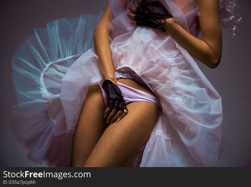 Woman in colorful  tutu covering her body