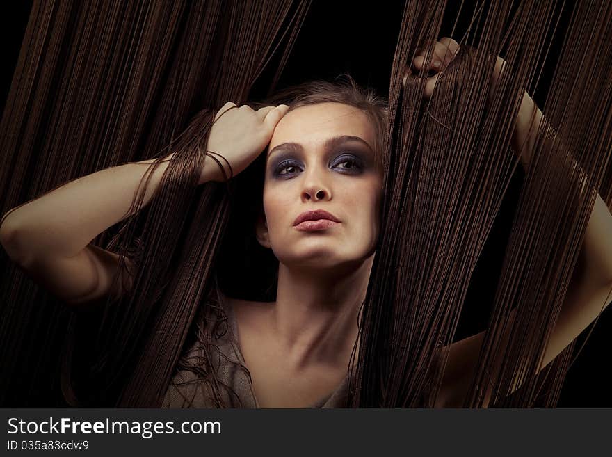 Portrait of pretty young woman with threads. Portrait of pretty young woman with threads