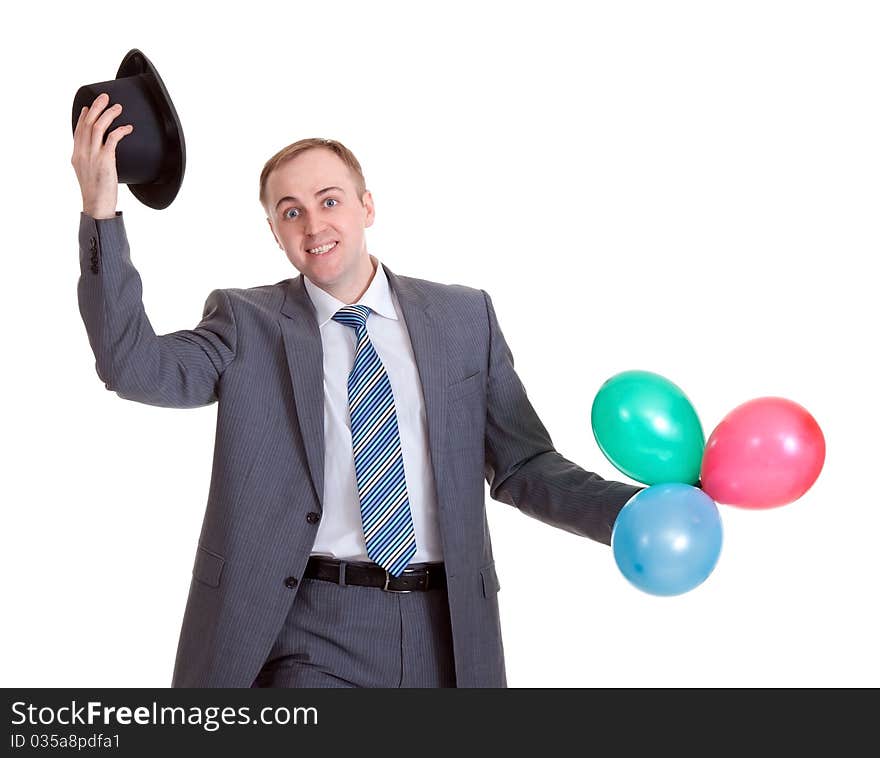 Businessman in a black hat with inflatable colored balls