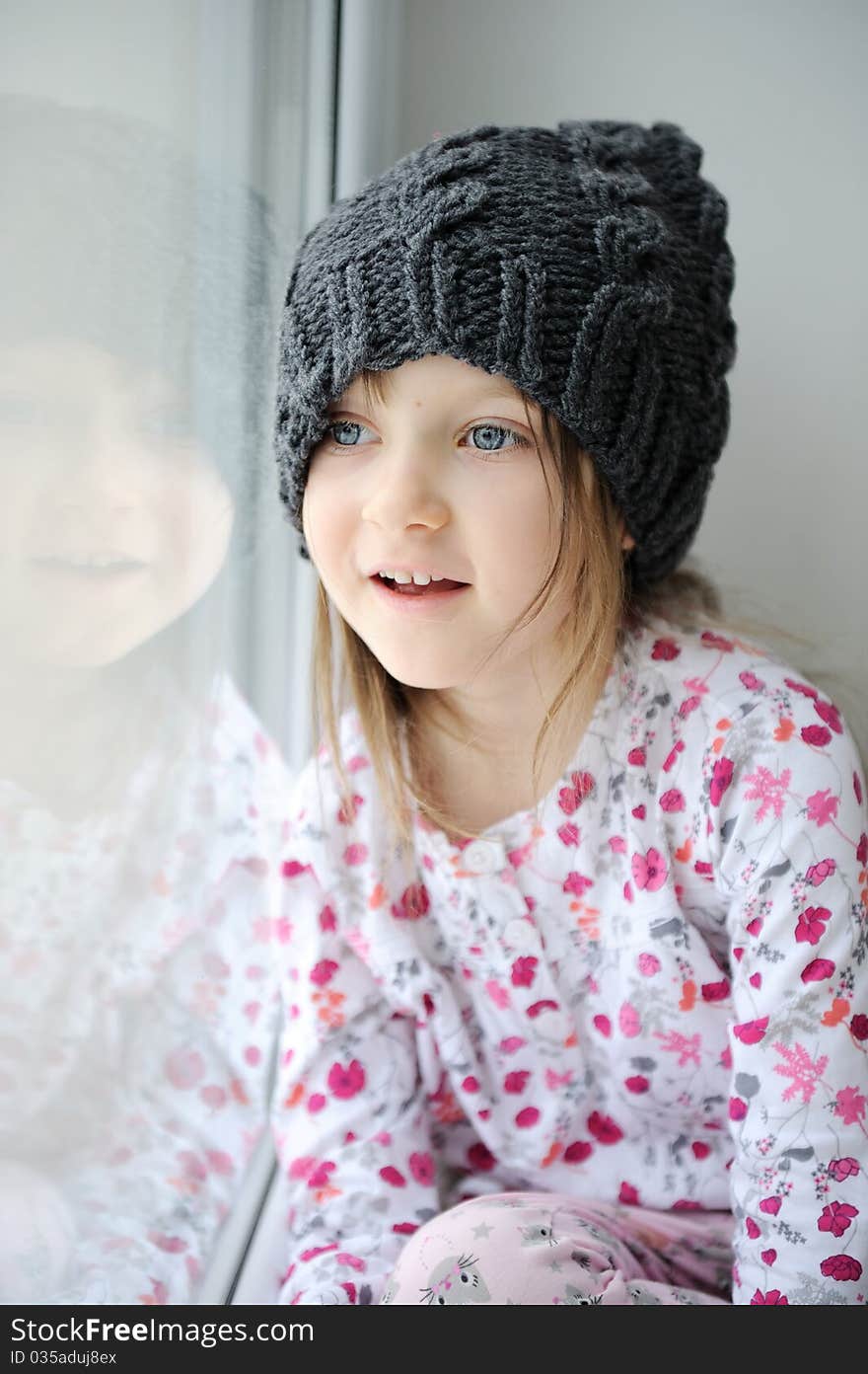 Adorable Little Girl In Grey Knit