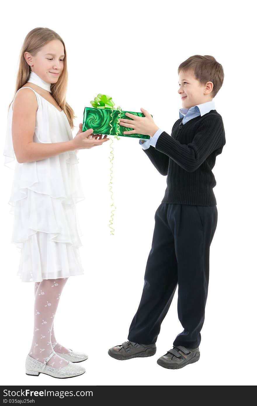 The boy gives to the girl a gift on a white background