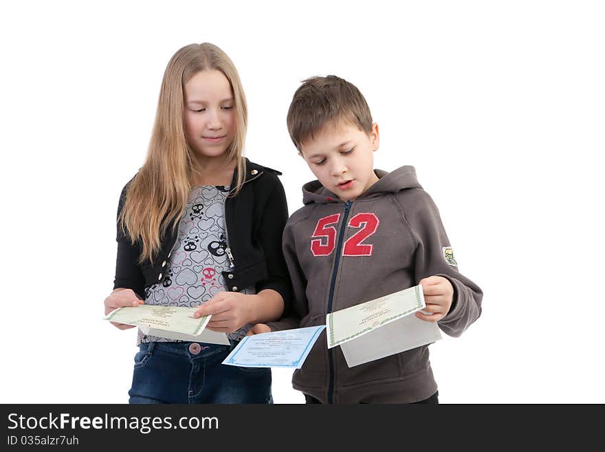 Children study the documents on a white background