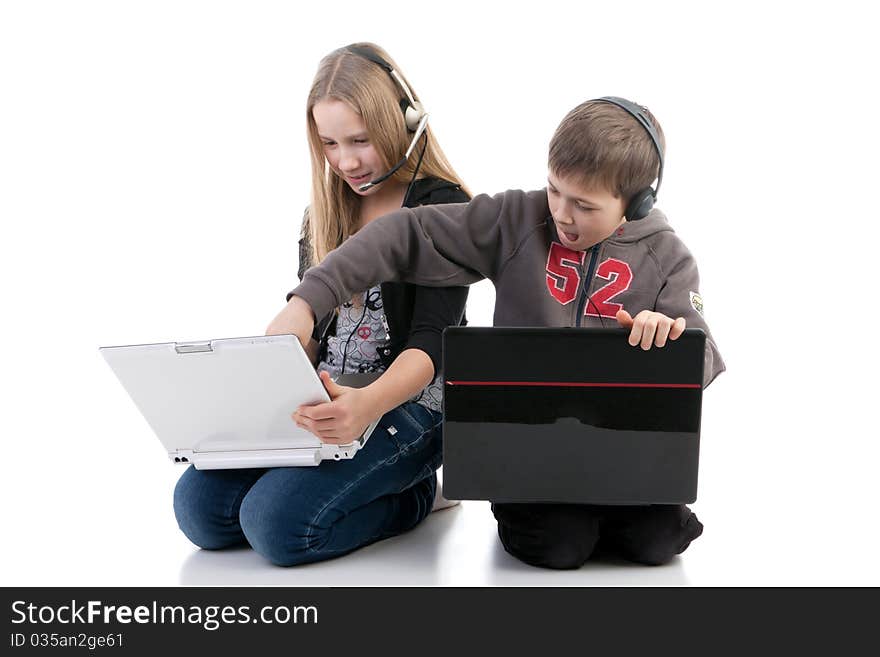 Children with laptops on a white background