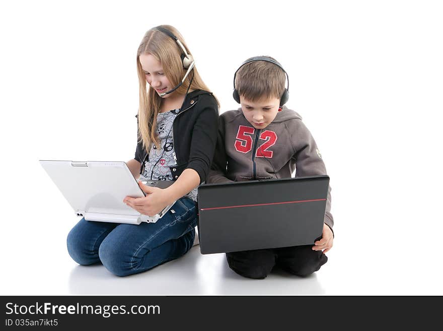 Children with laptops on a white background