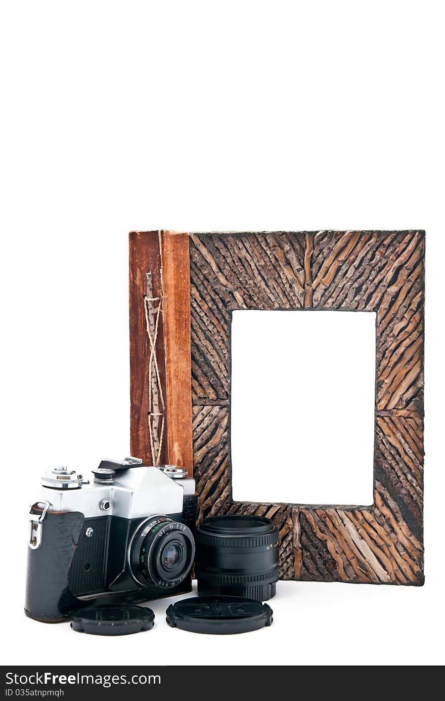 Vintage camera and photo album with empty picture. Isolated on white. Vintage camera and photo album with empty picture. Isolated on white