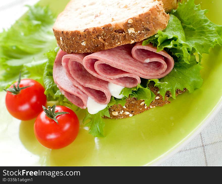 Rustic Sandwich with lettuce, ham and wholegrain bread