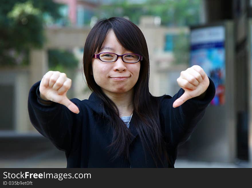 She shows her disagreement with happy face. She shows her disagreement with happy face.