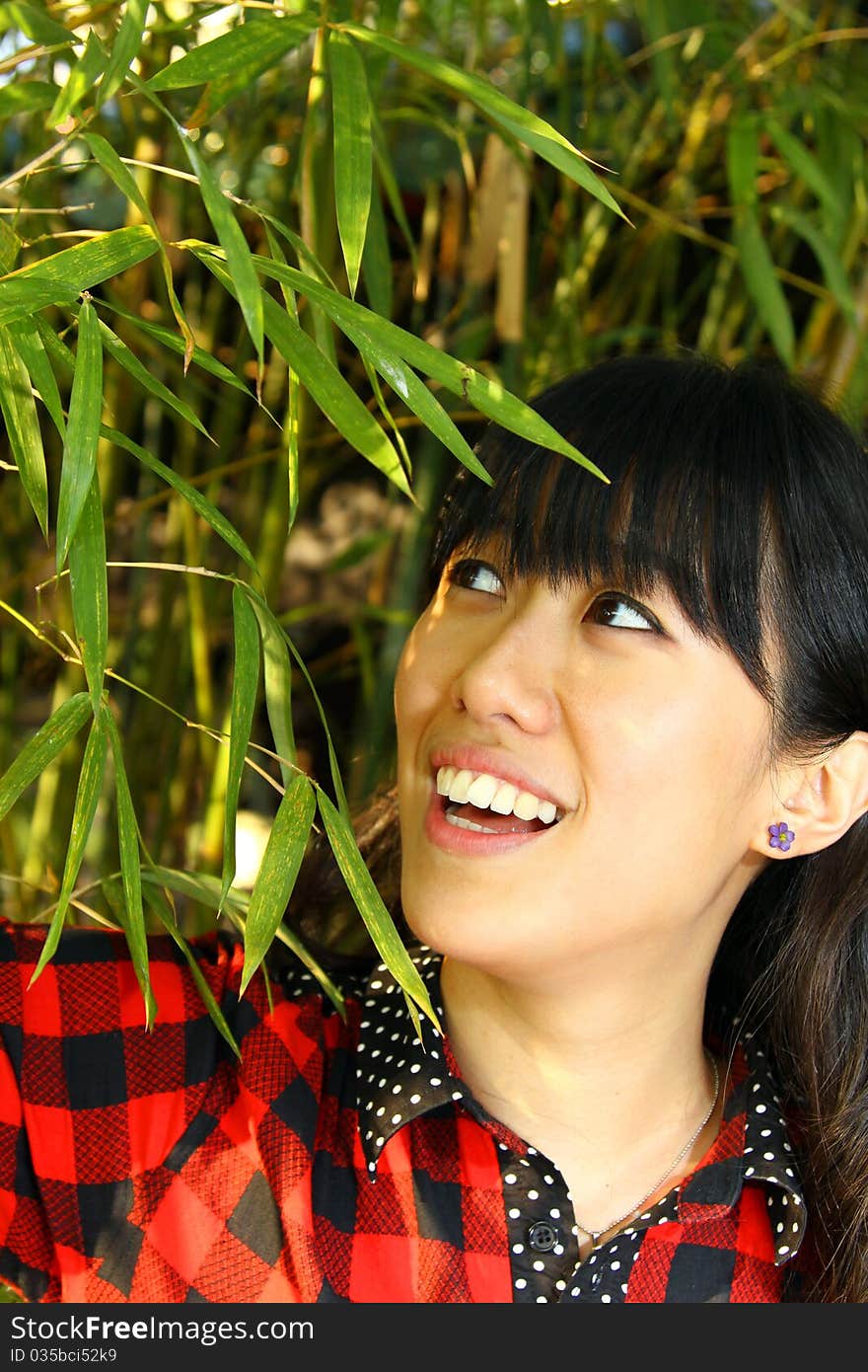 An asian girl who is smiling