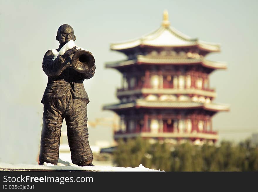 The sculpture stands in Datang Furong Garden of China. There are many folk custom exhibitions. The sculpture stands in Datang Furong Garden of China. There are many folk custom exhibitions.