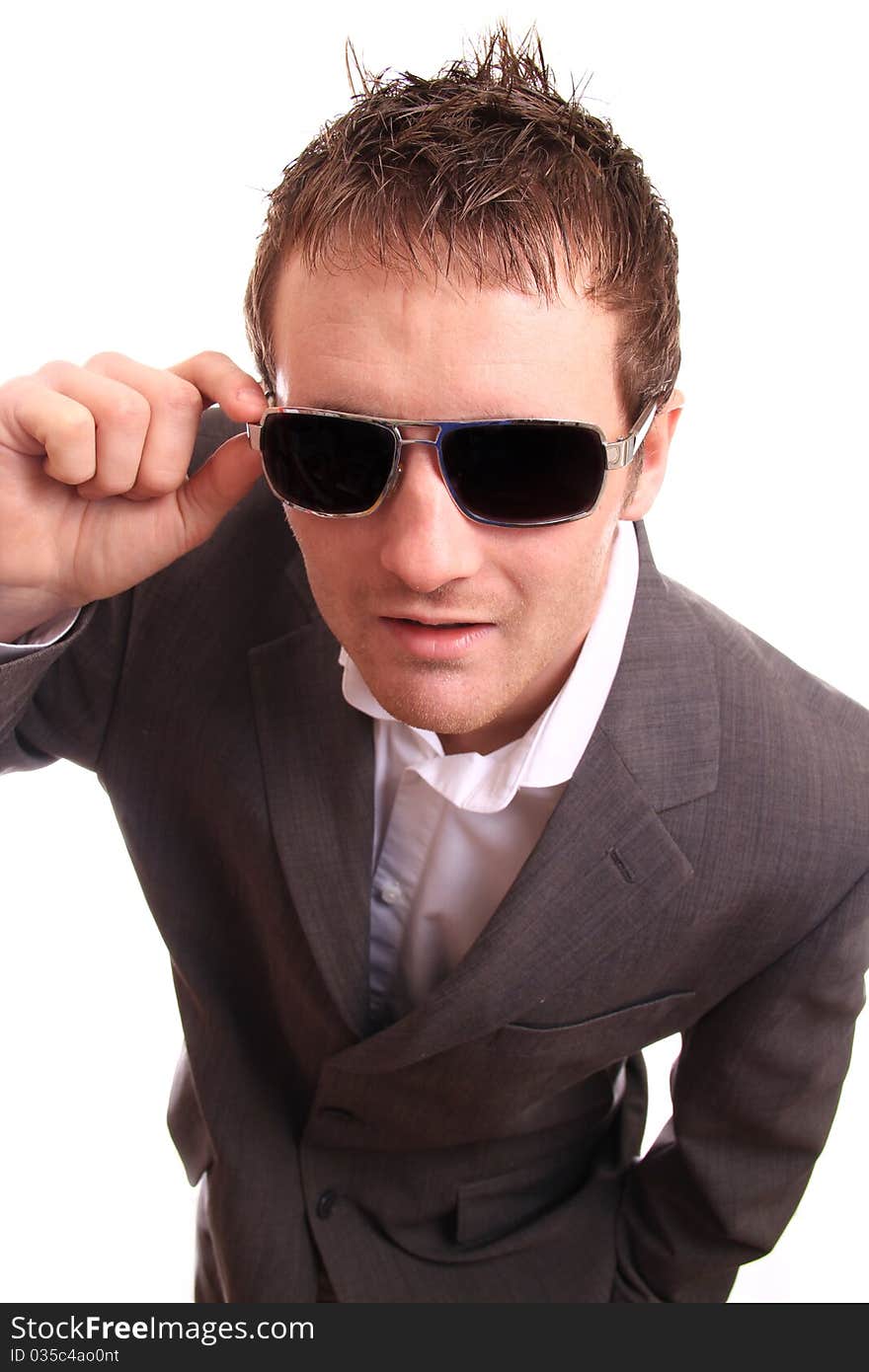 Successful business man looking at the camera with confidence with shades on