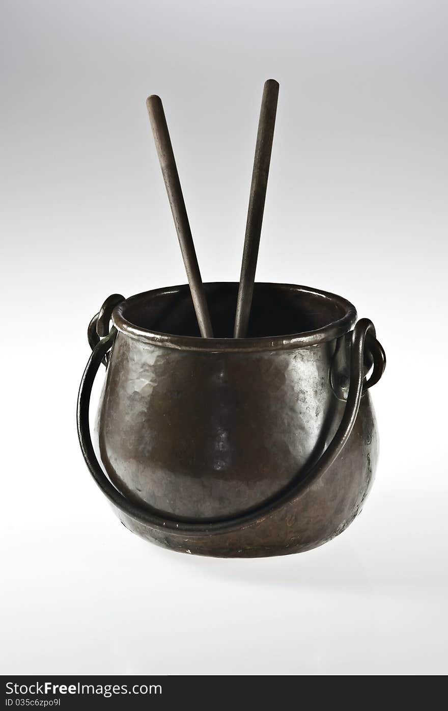 Copper pot with chopsticks