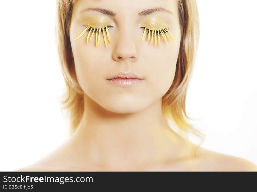 Woman wearing petal eyelashes