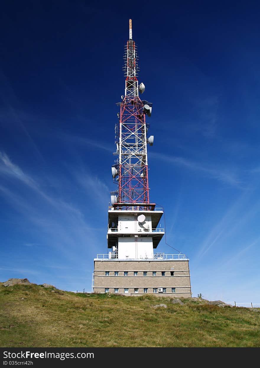 A communications tower for tv and mobile phone signals. A communications tower for tv and mobile phone signals.