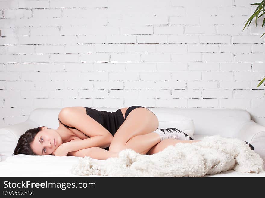 Beautiful woman lying and sleep on the snowy bed. Beautiful woman lying and sleep on the snowy bed