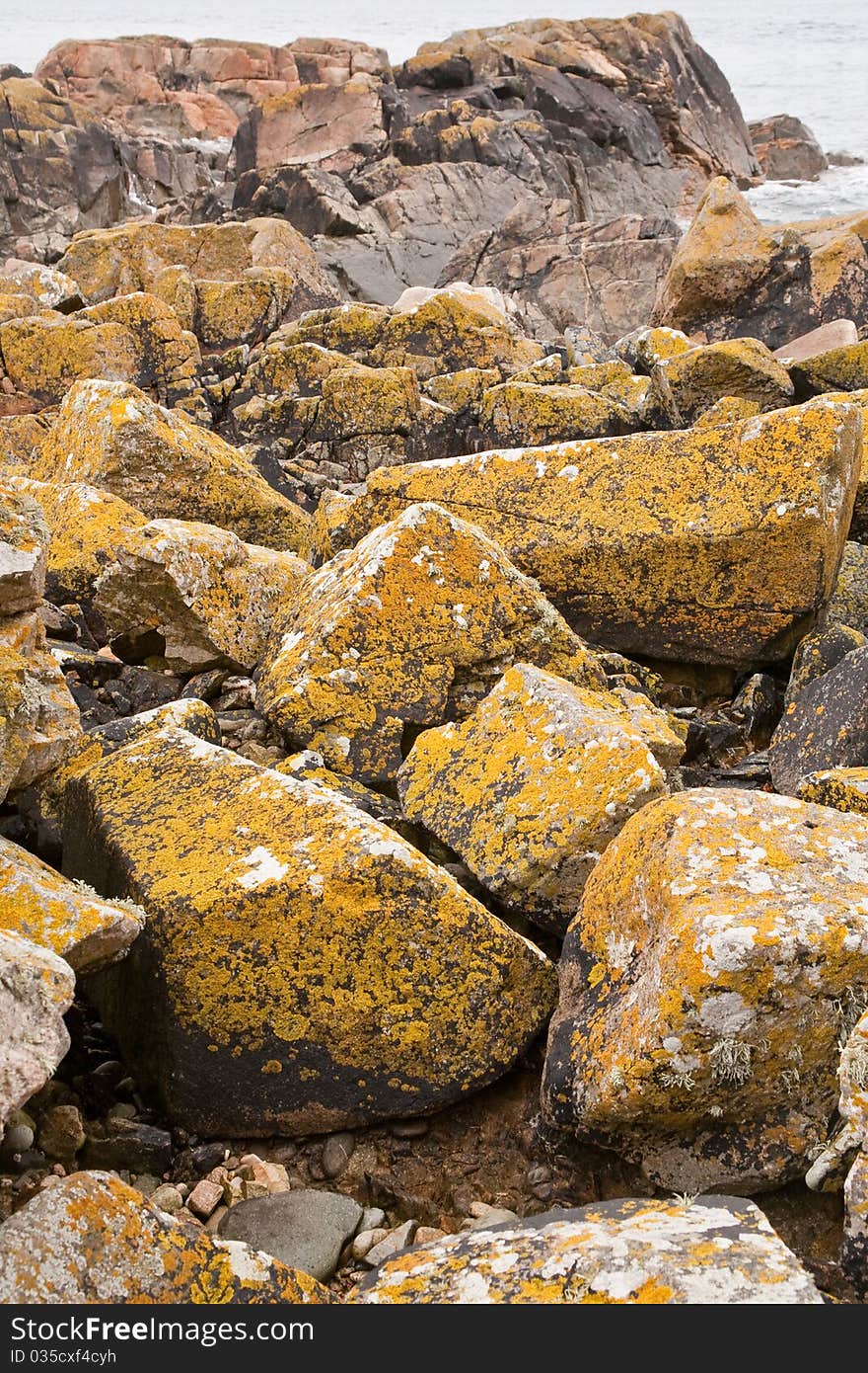 Granite boulder on Pink Granite Coast in Brittany, in France. Granite boulder on Pink Granite Coast in Brittany, in France