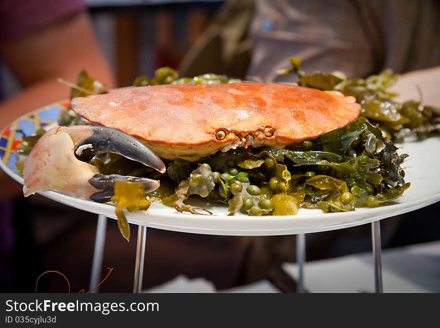 Crab on plate in restaurant