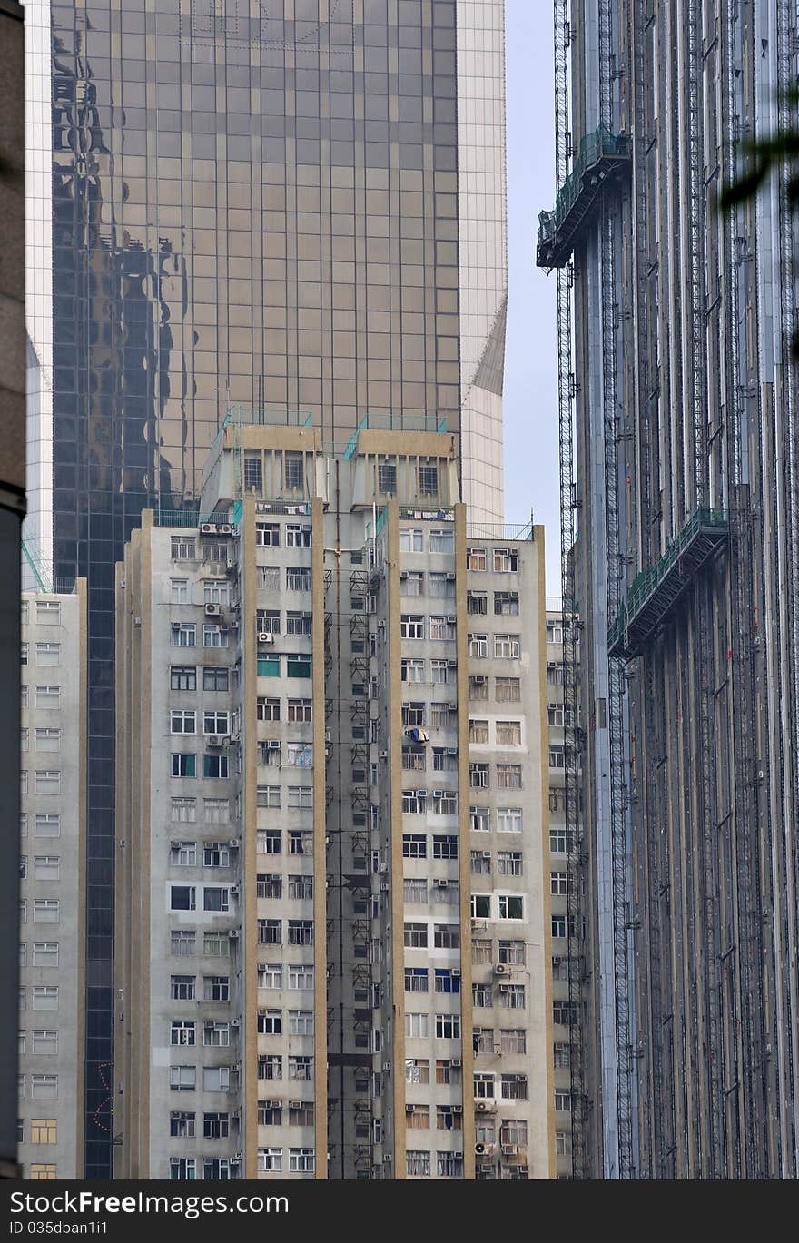 Different buildings, new business building and old apartment building in city urban. Different buildings, new business building and old apartment building in city urban.