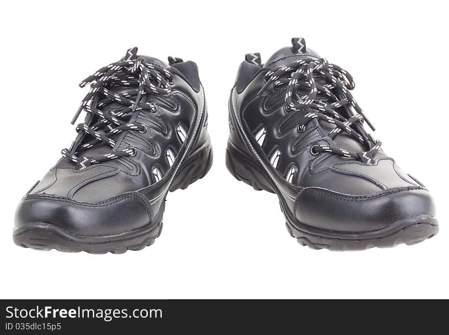 Series. Black leather shoes on a white background