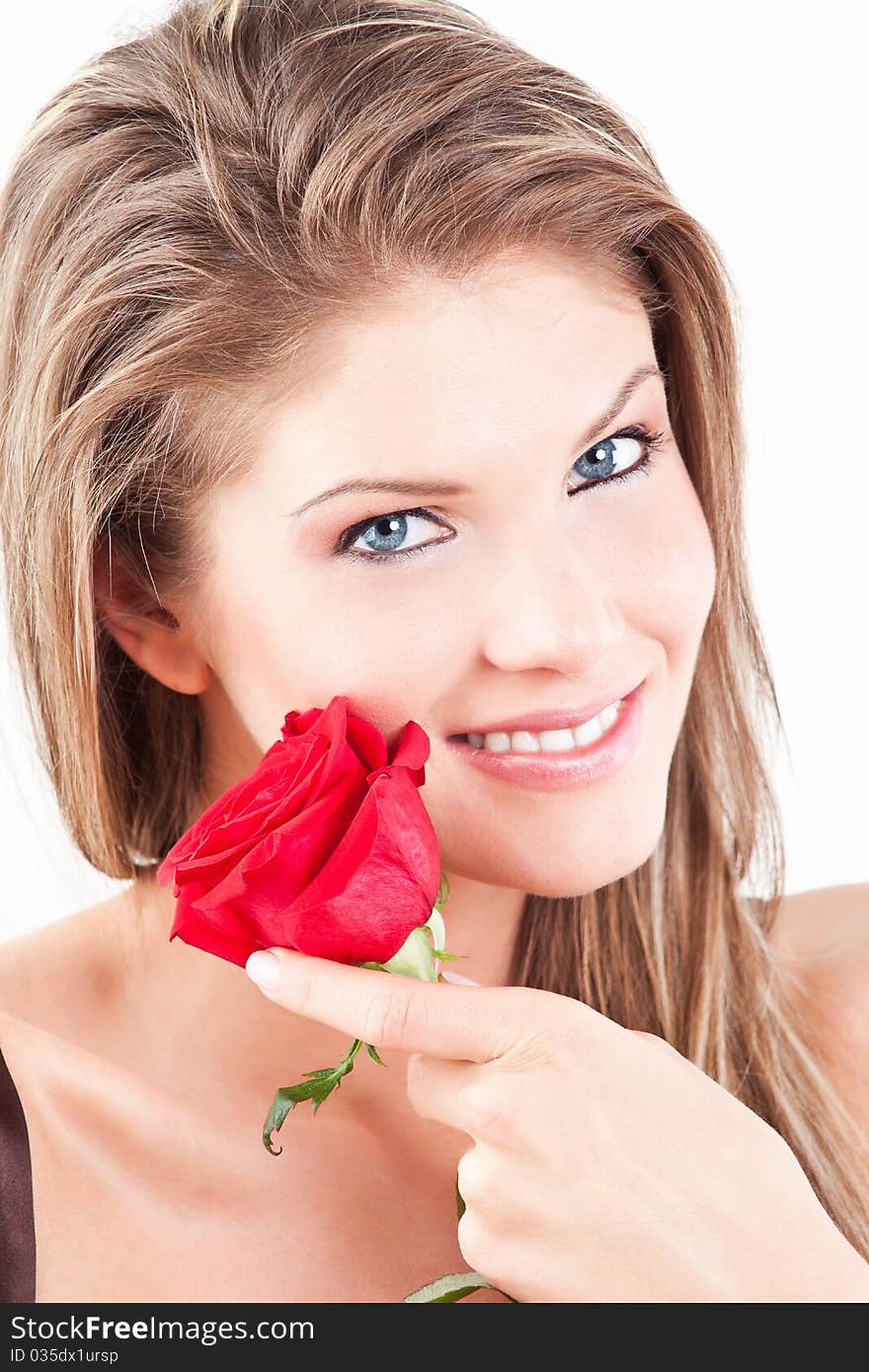 Young, beauty girl with red rose