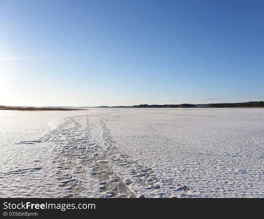 The lake Vidostern in Varnamo during the Winter time completely frozen. Sweden. The lake Vidostern in Varnamo during the Winter time completely frozen. Sweden.