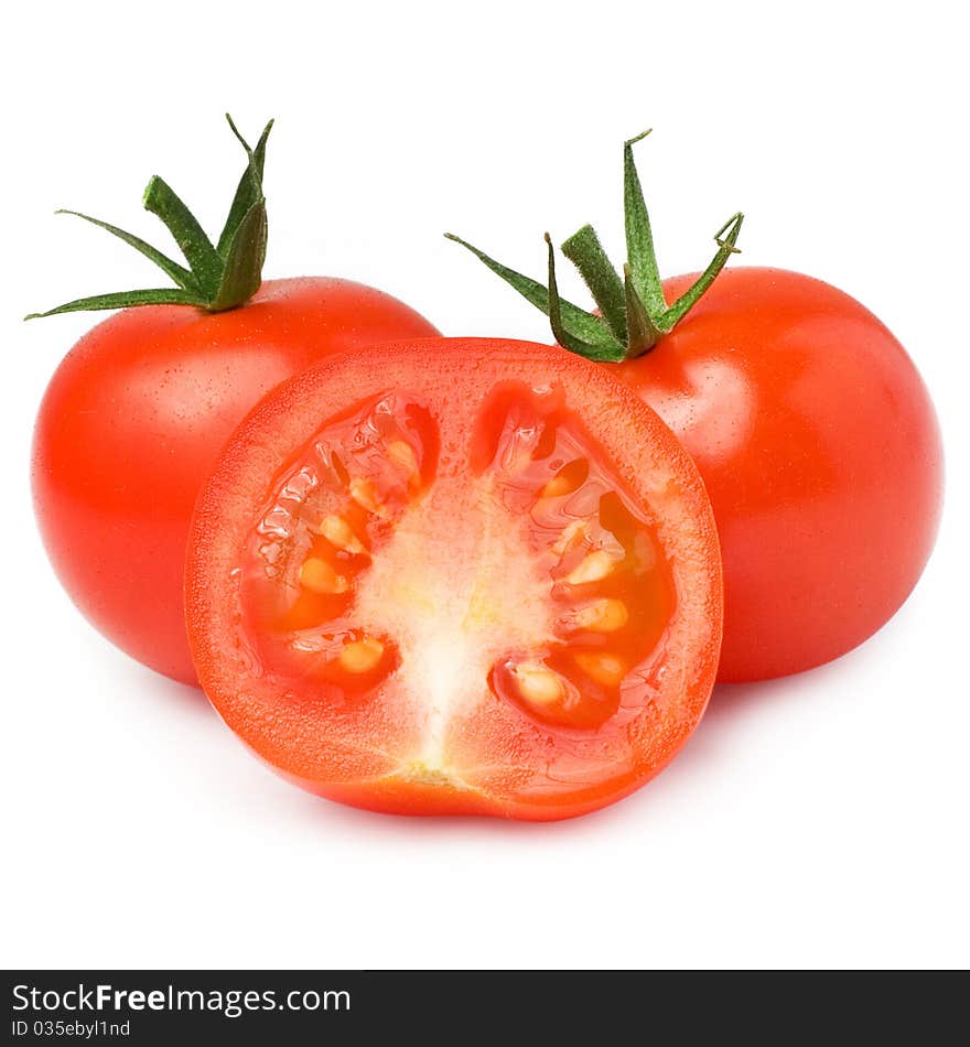 Red tomato vegetable with cut isolated on white background