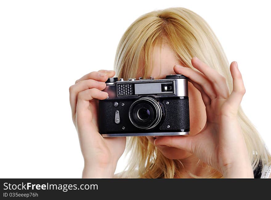 An image of a young woman with a camera. An image of a young woman with a camera