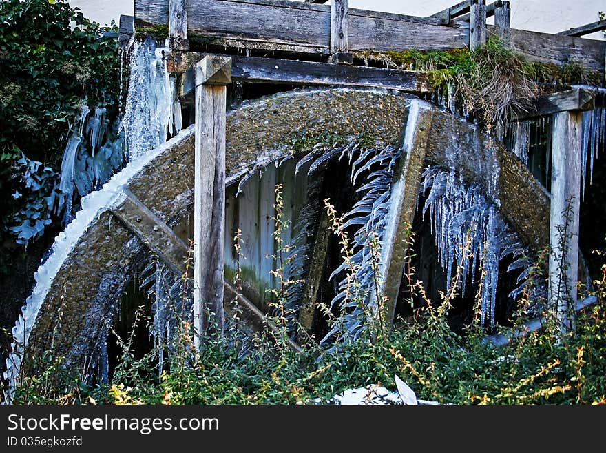 Frozen water wheel with icicles