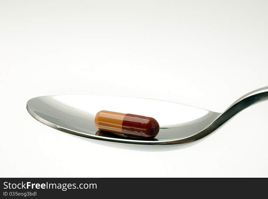 Pill in a spoonful polished