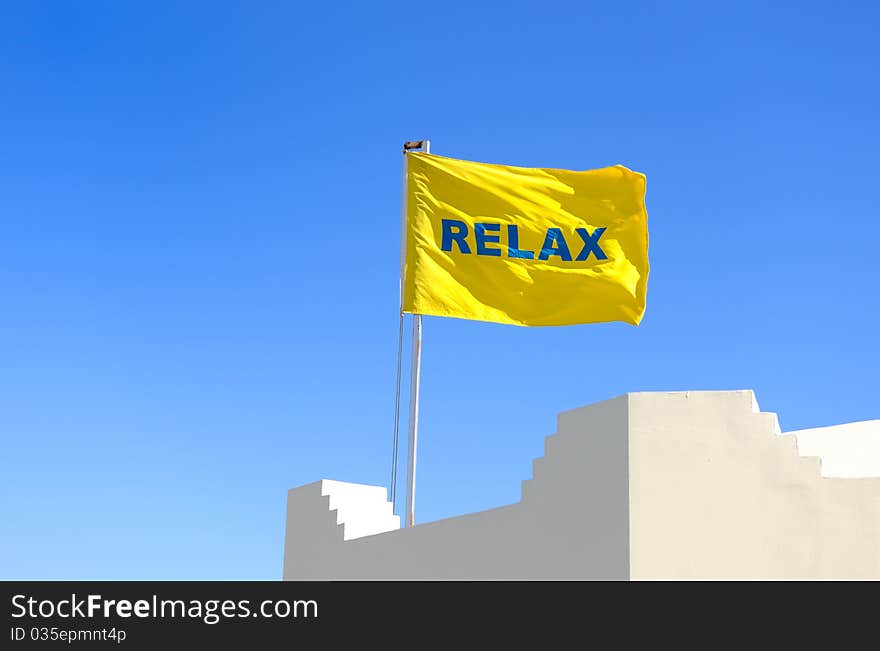 Yellow Flag With A Word Relax