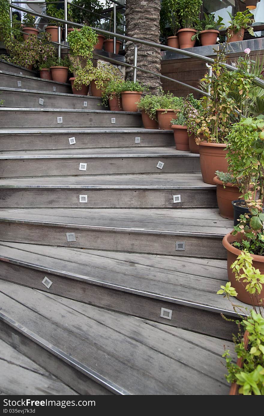 The old staircase on the background of an old house. The old staircase on the background of an old house