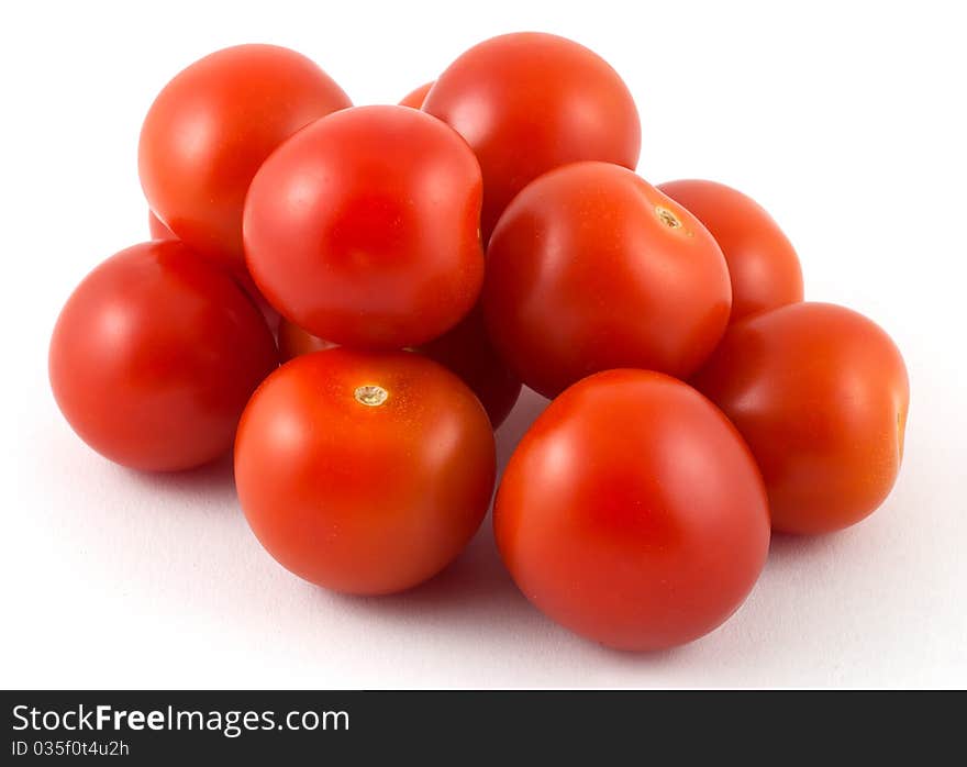 Studio shot of cherry tomatoes , isolated on white background