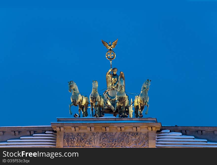 Brandenburg gate with quadriga at night in winter. Brandenburg gate with quadriga at night in winter