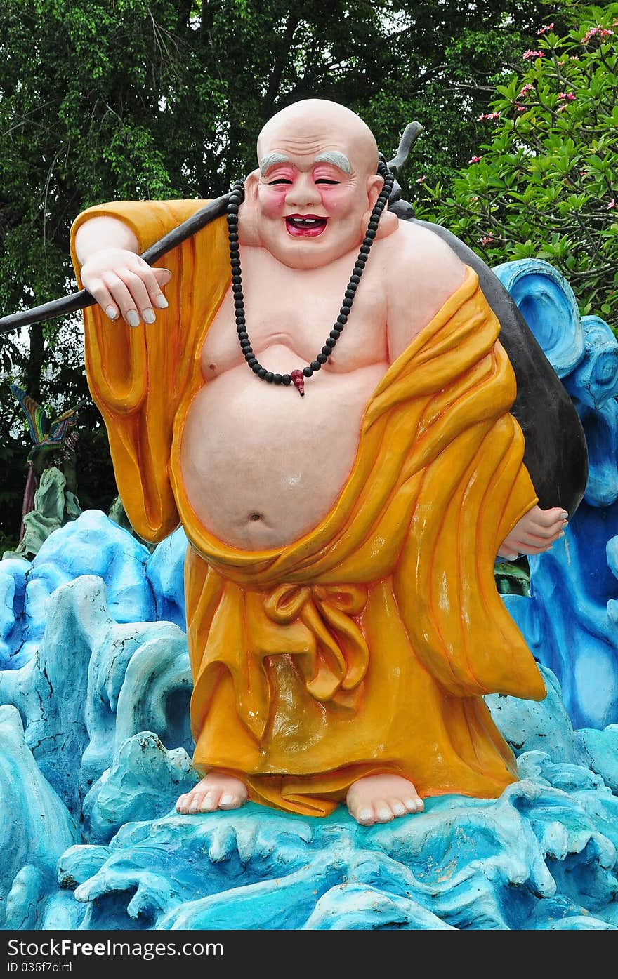 Statue Of A Standing Laughing Buddha