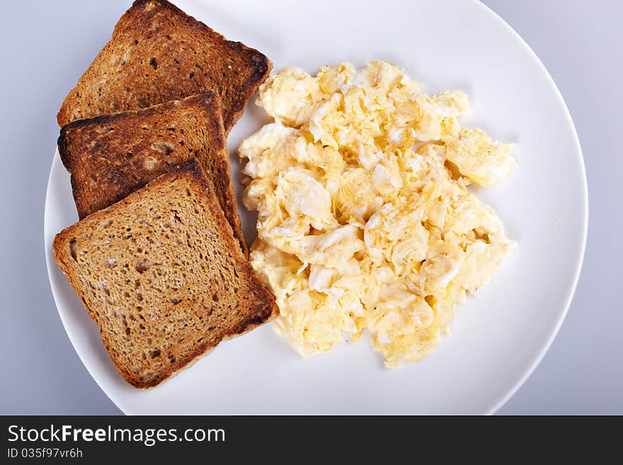 Breakfast - toasts, eggs, bacon