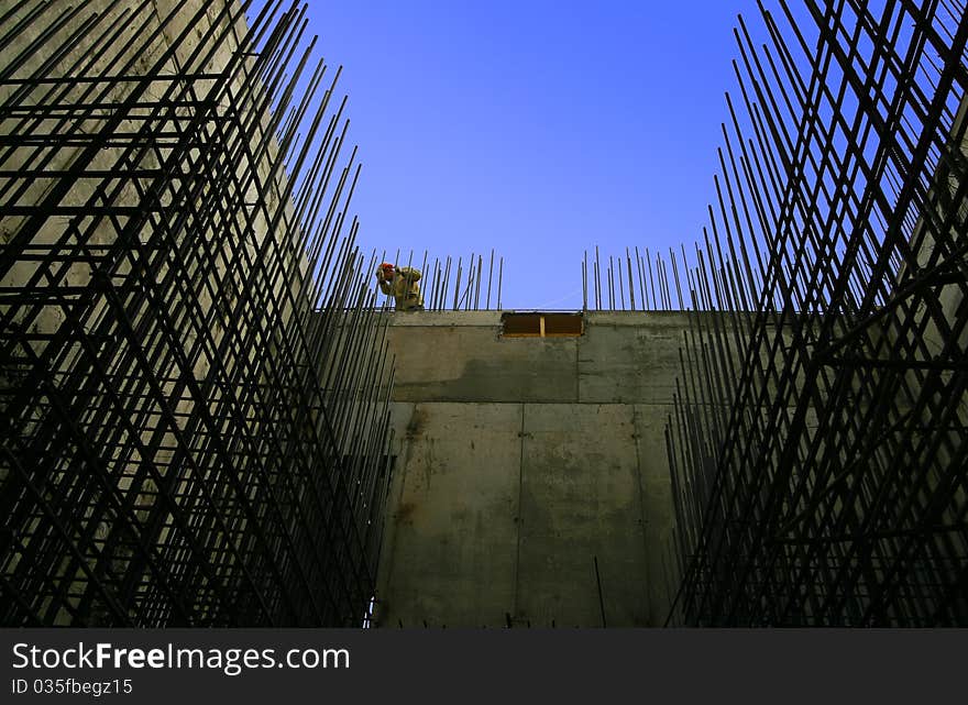 Builders on building. Method of concrete pouring