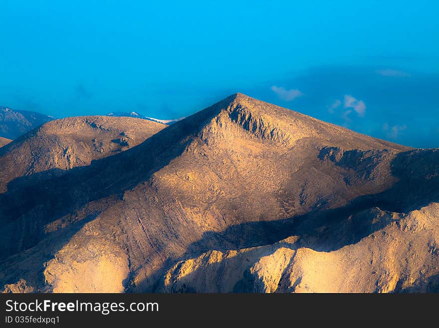 Landscapes with Mountain peak in sunset