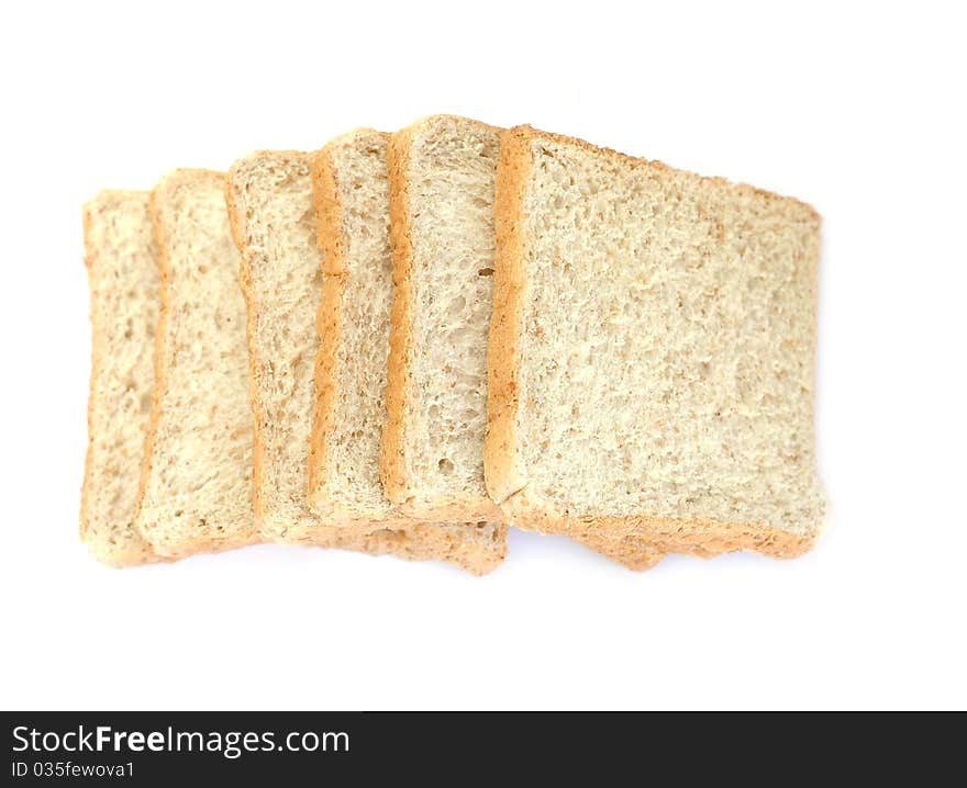 Whole wheat bread on white background