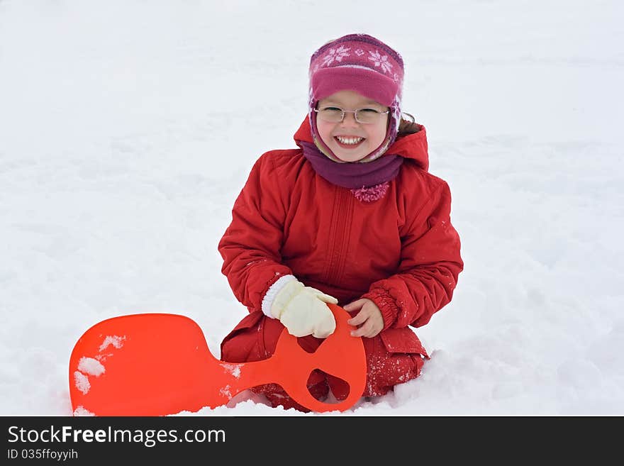 Girl resting in the snow