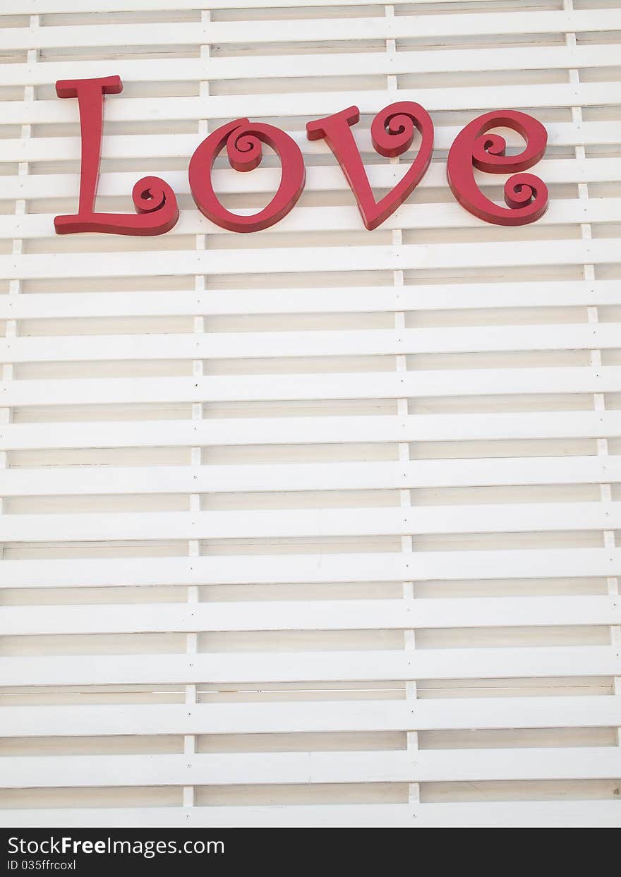 Red Love Sign letter on white panel