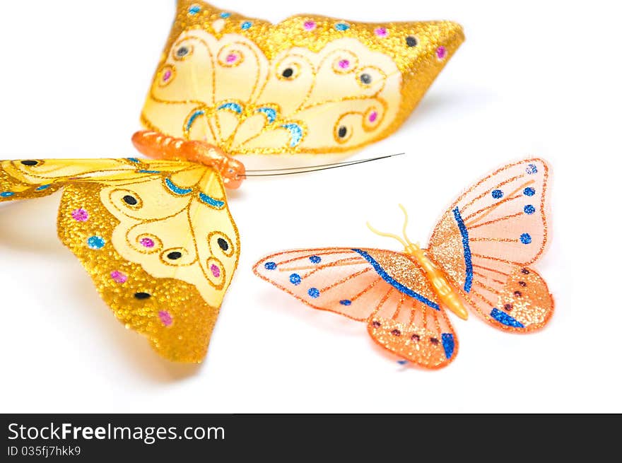 Artificial butterflies on the white background