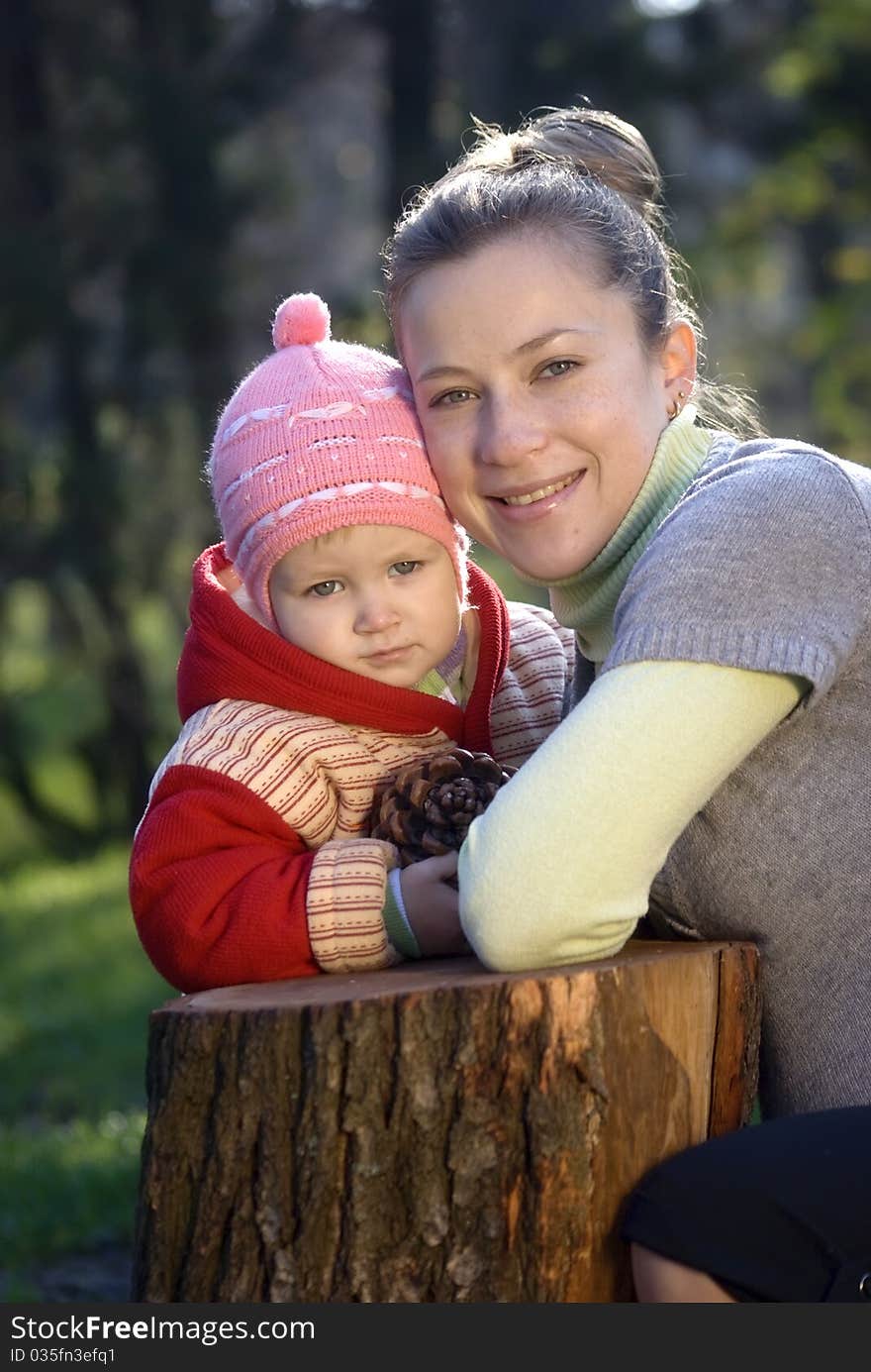 mother and daughter playing outdoors. mother and daughter playing outdoors