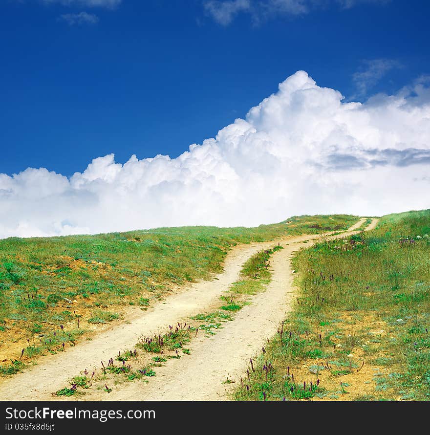 Road lane to sky. Nature composition.