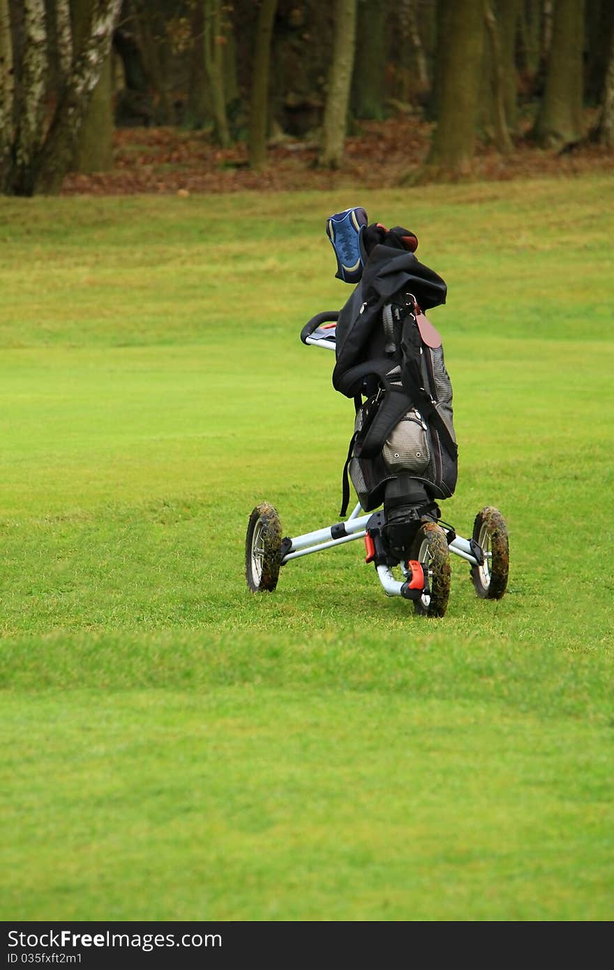 Image of a golf bag on the green. Image of a golf bag on the green